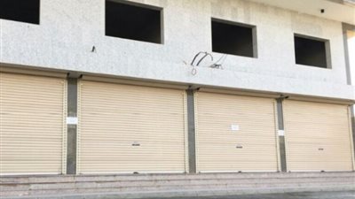 المجتمعات العمرانيه مزاد علني بمدينه الشيخ زايد لبيع  14 محلًا تجاريًا
