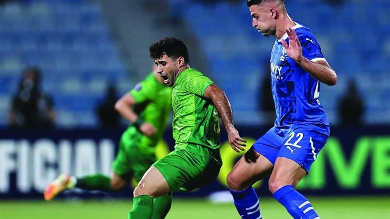 الشرطة العراقي ضد باختاكور الأوزباكستاني