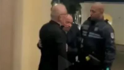 حضن في المطار يثير أزمة سياسية بألمانيا .. ما القصة ؟