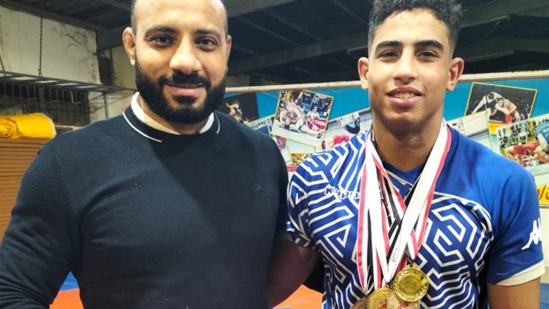 البطل يحيي عماد الجمل مع المدرب الخاص به كابتن وائل عيد