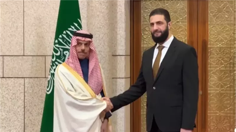 أحند الشرع  ووزير الخارجية السعودي 
