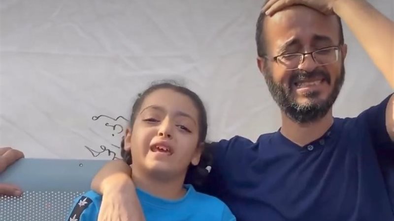 فتاة فلسطينية ووالدها