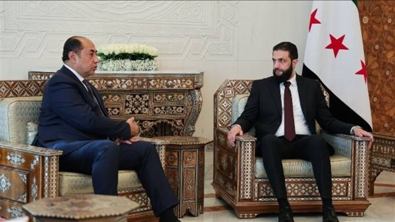 الرئيس السوري أحمد الشرع والسفير حسام زكي