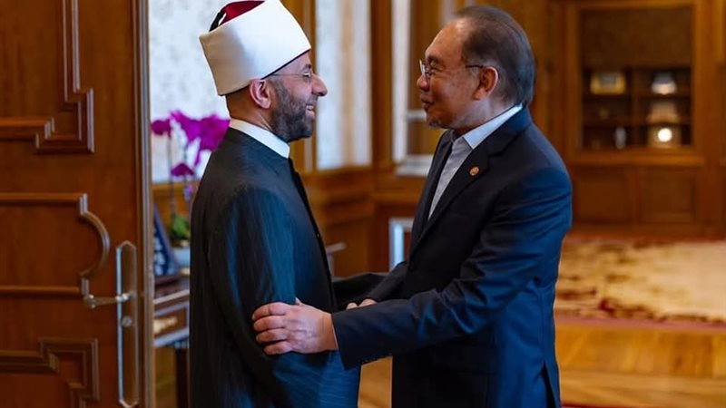 الأزهري ورئيس وزراء ماليزيا