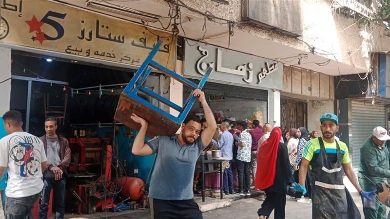 رفع إشغالات المحال بالدقي