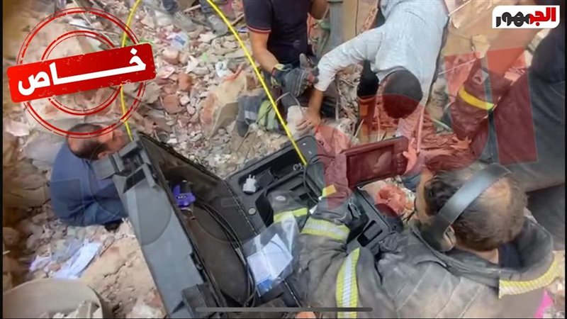 قوات الحماية المدنية أثناء إستخدام الجهاز في البحث عن الضحاي