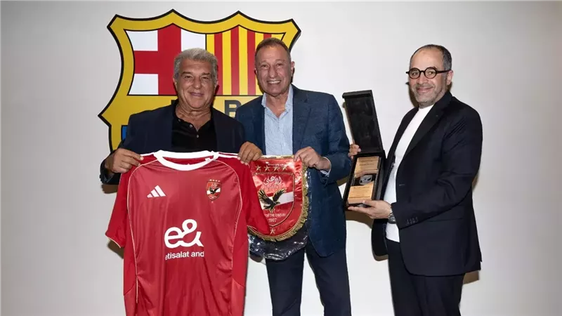 محمود الخطيب ورئيس برشلونة خوان لابورتا