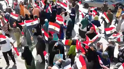 أعلام مصر ترفرف..ومواطنو بولاق والدقي يصنعون مشهدا وطنيا في ختام انتخابات الشيوخ