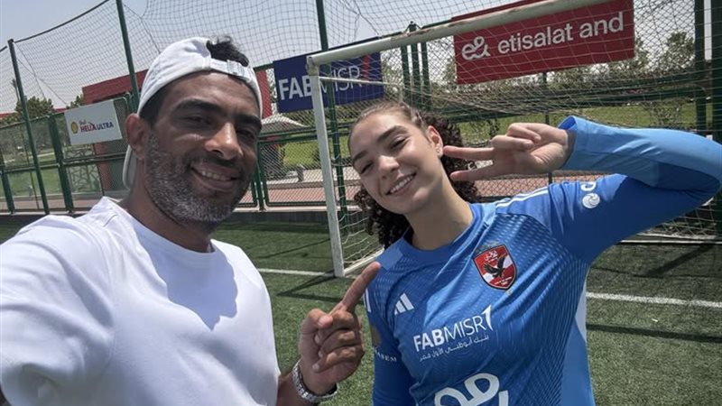 شادي محمد وعزة الفولي
