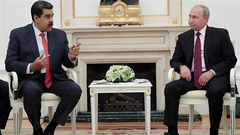 بوتين ومادورو في لقاء سابق 