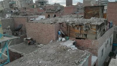الجيزة تزيل جمالون مخالف بشارع ربيع الجيزي وتشدد على رفع التعديات