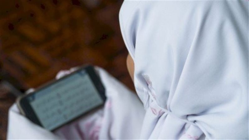 المرأة وقراءة القرآن