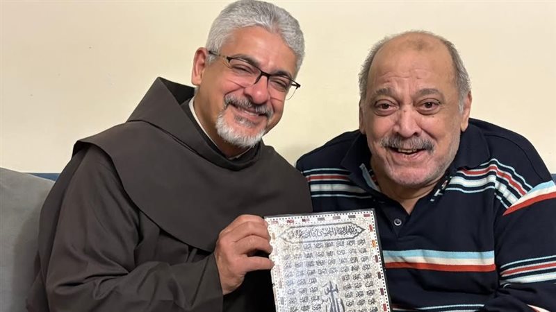 الأب بطرس دانيال وضياء الميرغني