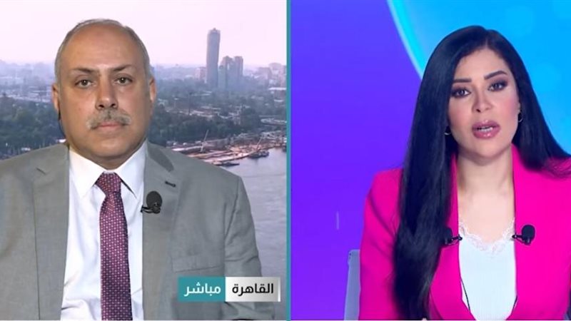  الدكتور حسن سلامة مع أمل الحناوي