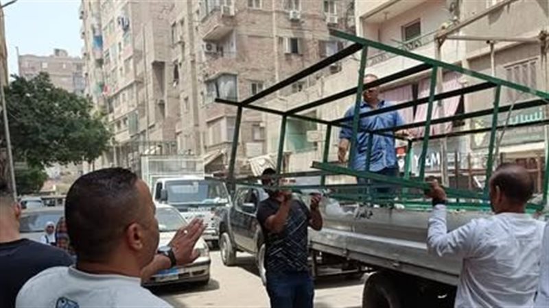رفع الإشغالات بشارعي الثلاثيني وفيصل بالعمرانية