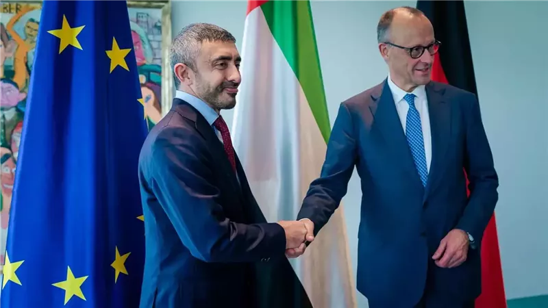 عبدالله بن زايد يلتقي المستشار الألماني 
