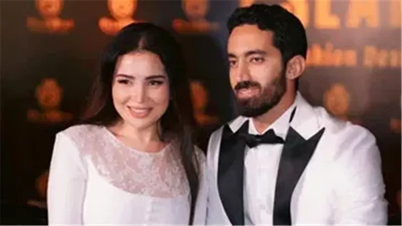 مي عز الدين وزوجها