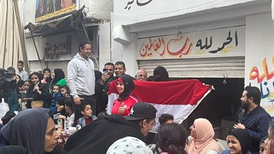 شاهد، بعلم مصر.. سيدات تحتفل بمائدة إفطار المطرية التاريخية